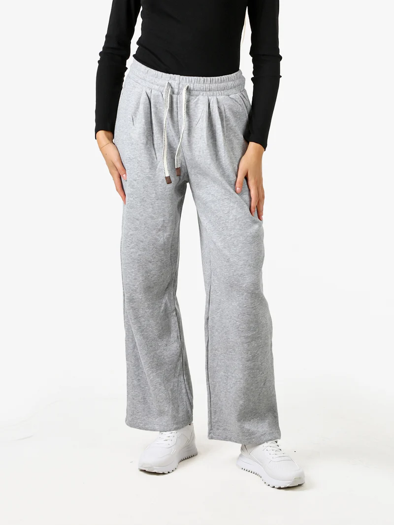 Pantaloni donna in felpa a gamba larga con coulisse - grigio