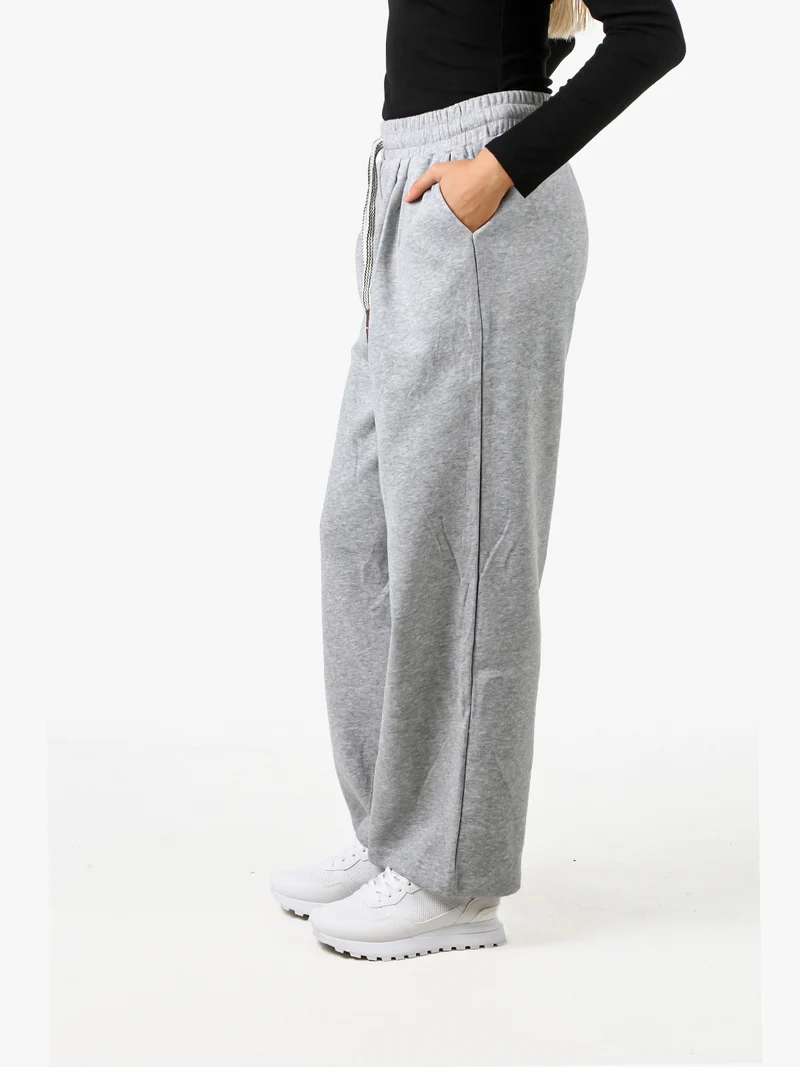 Pantaloni donna in felpa a gamba larga con coulisse - grigio