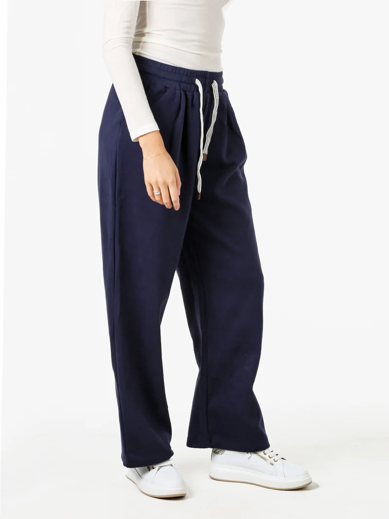 Pantaloni donna in felpa a gamba larga con coulisse - blu scuro