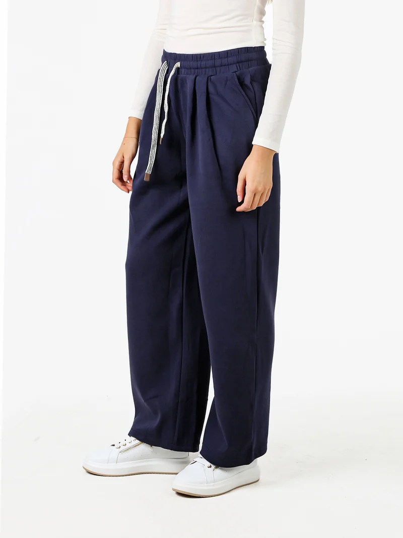Pantaloni donna in felpa a gamba larga con coulisse - blu scuro