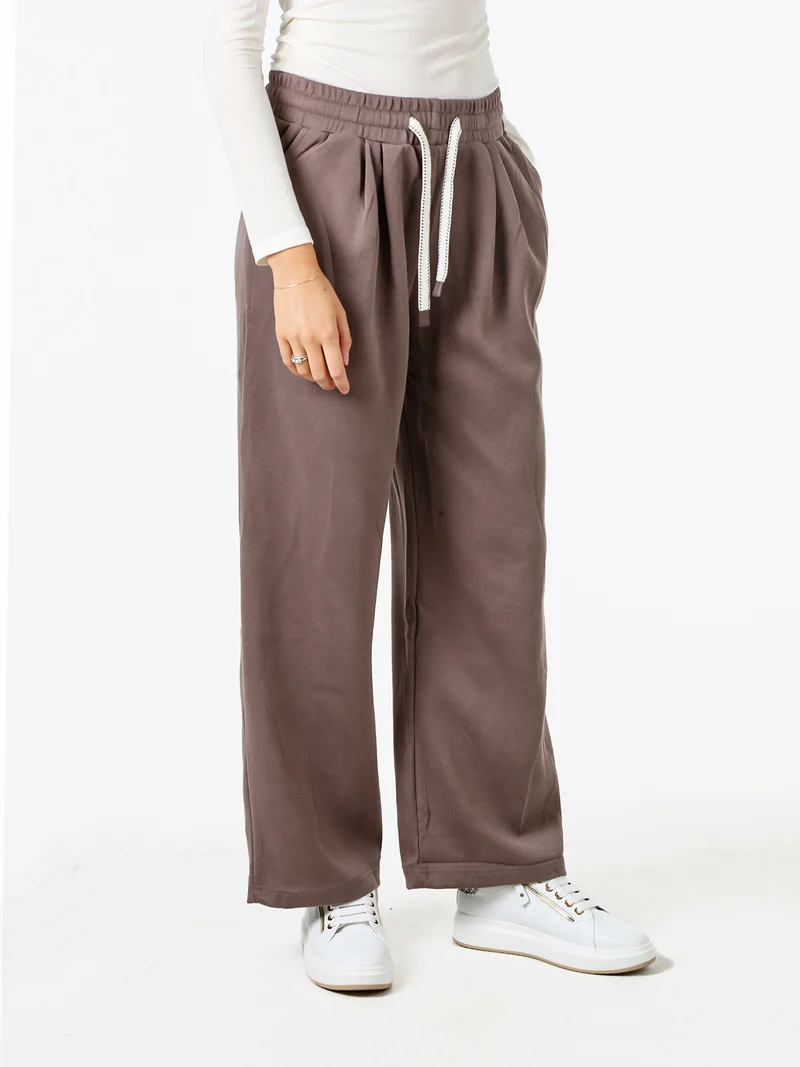 Pantaloni donna in felpa a gamba larga con coulisse - taupe