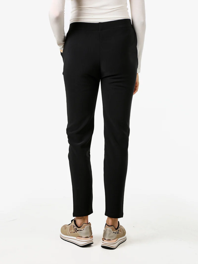 Pantaloni donna con elastico in vita e interno felpato - nero