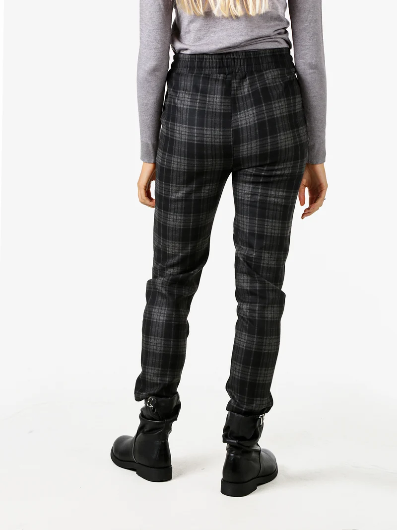 Pantaloni donna felpati con stampa a quadri e coulisse - nero