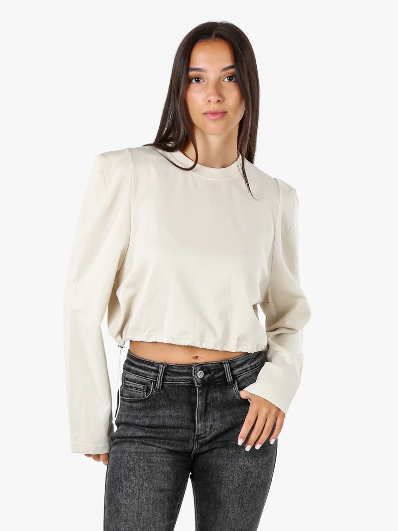 T-shirt donna cropped con maniche lunghe a sbuffo - beige