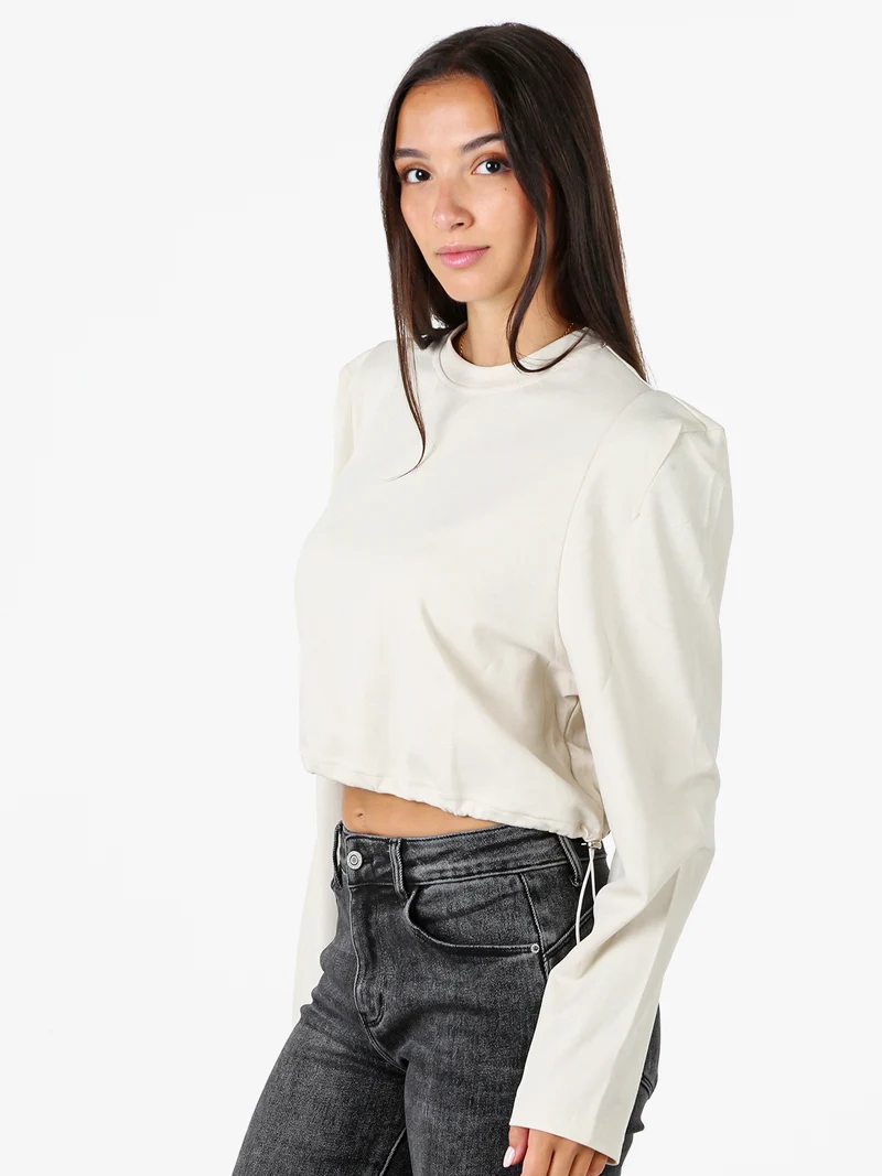 T-shirt donna cropped con maniche lunghe a sbuffo - beige