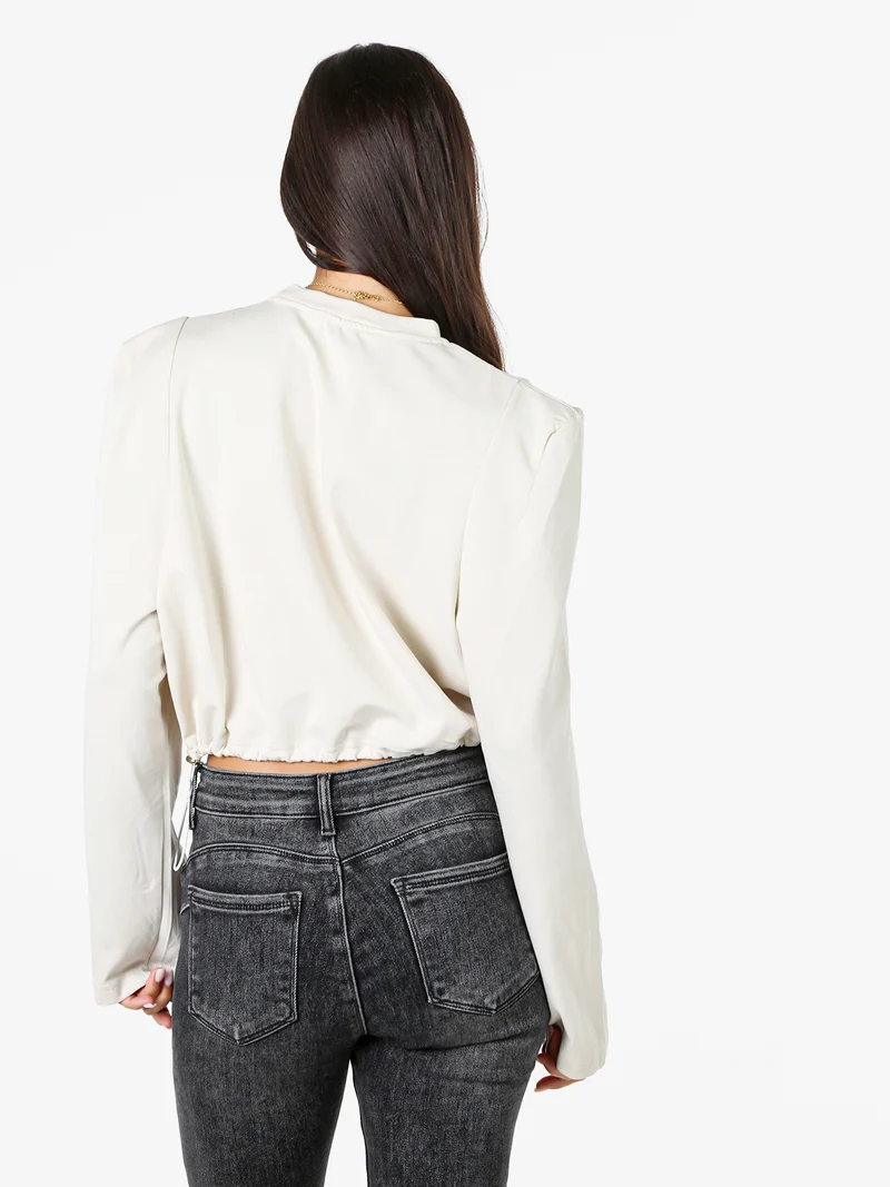 T-shirt donna cropped con maniche lunghe a sbuffo - beige