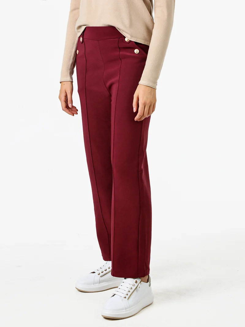 Pantaloni donna a vita alta con interno felpato e bottoni decorativi dorati - bordeaux