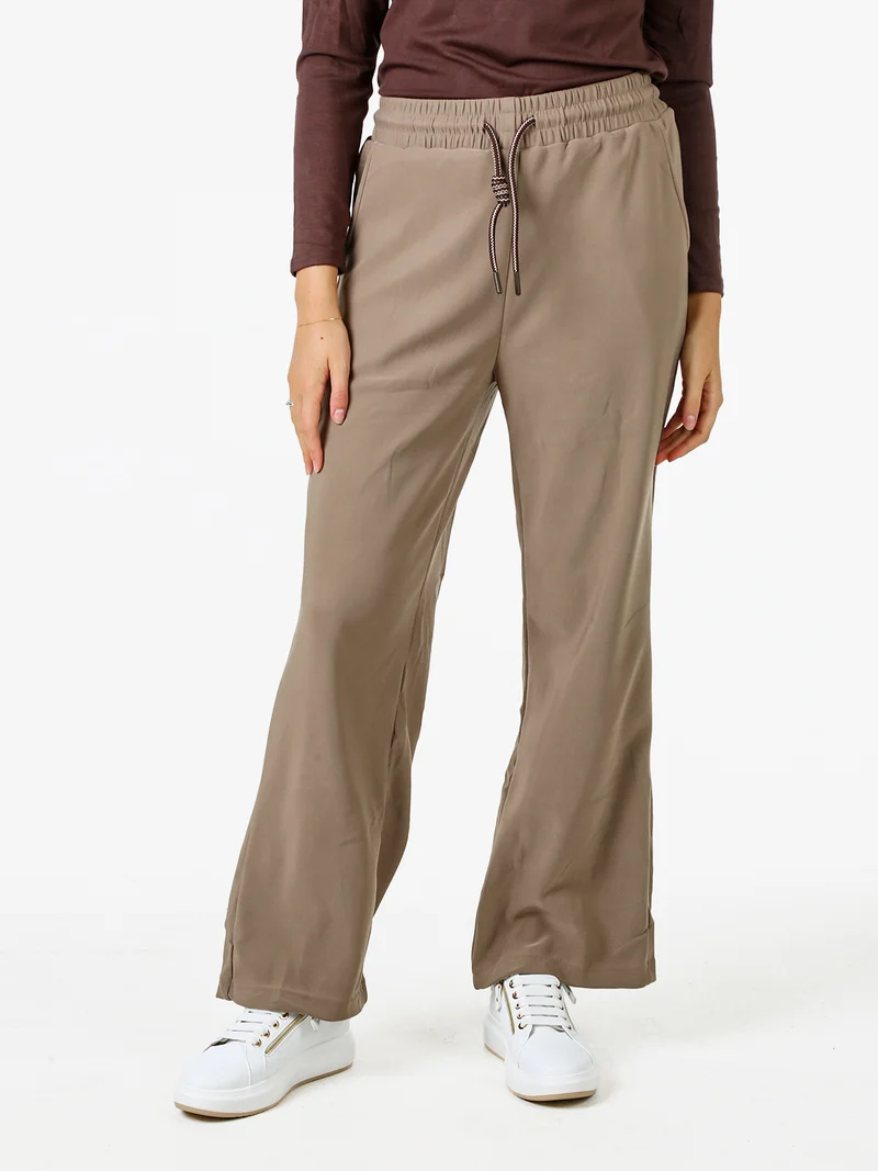 Pantaloni donna elasticizzati in tessuto tecnico con coulisse - taupe