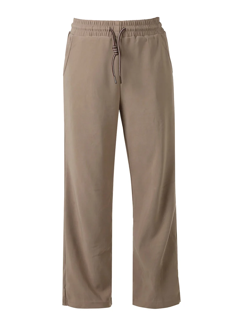 Pantaloni donna elasticizzati in tessuto tecnico con coulisse - taupe