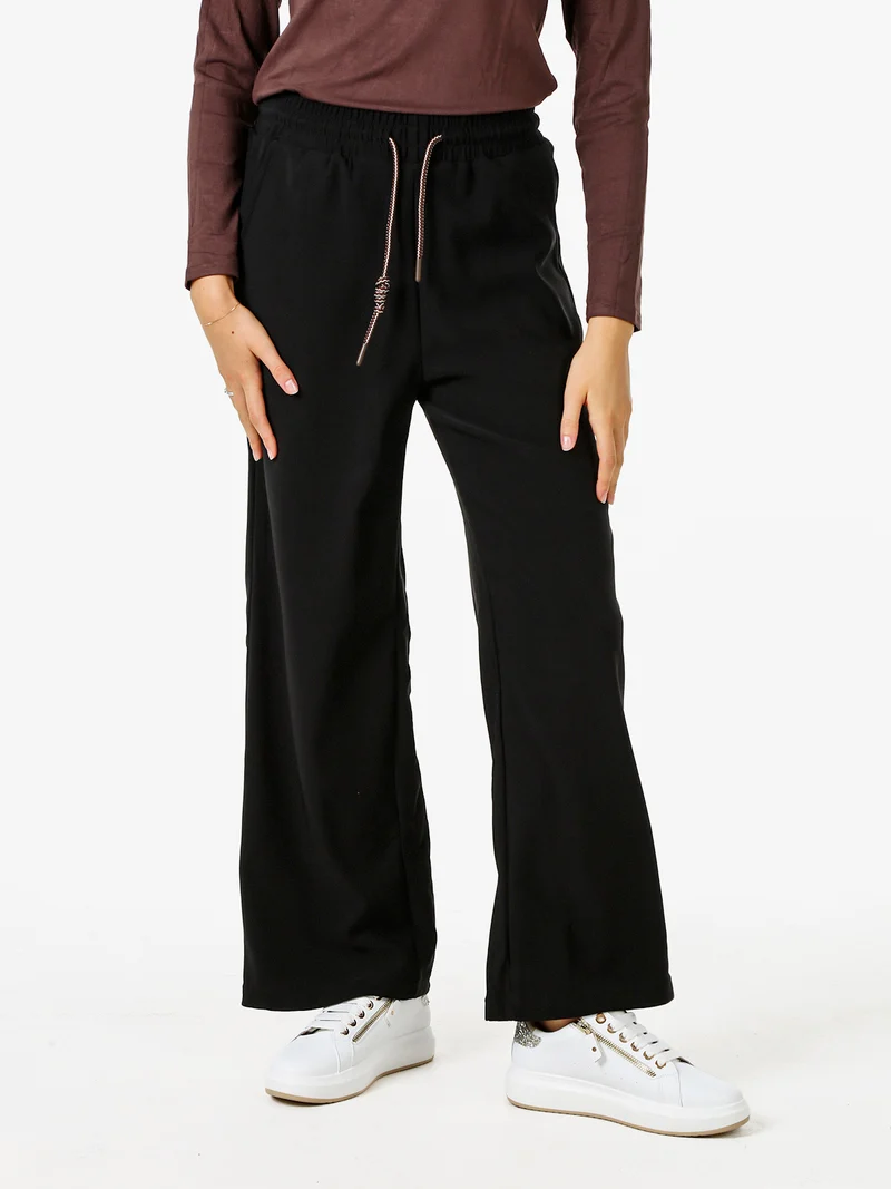 Pantaloni donna elasticizzati in tessuto tecnico con coulisse - nero