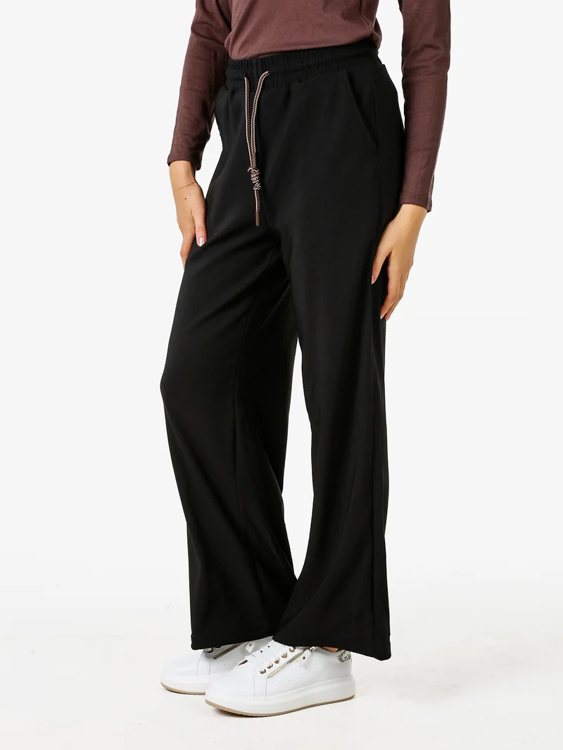 Pantaloni donna elasticizzati in tessuto tecnico con coulisse - nero