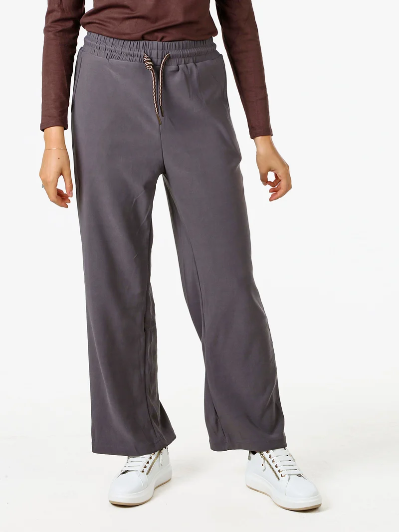 Pantaloni donna elasticizzati in tessuto tecnico con coulisse - grigio