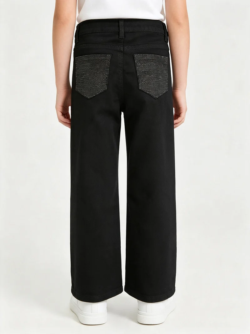 Pantaloni jeans da bambina con micro borchie sul retro - nero
