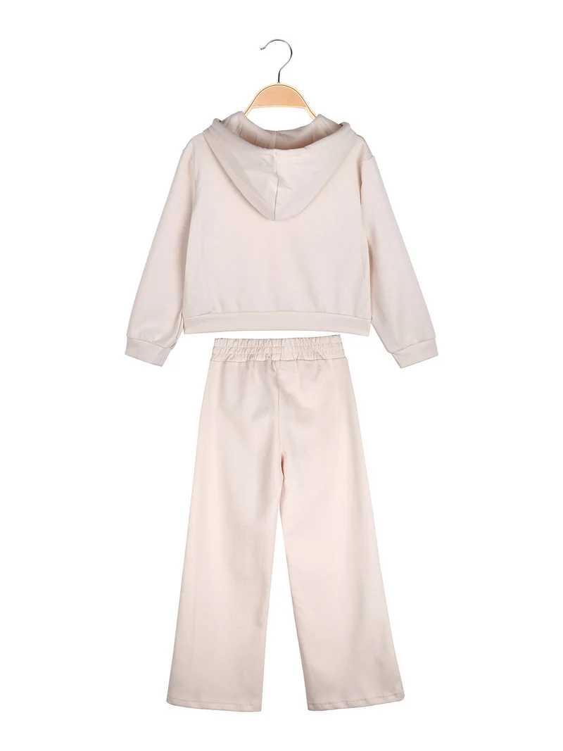 Completo 2 pezzi da ragazza con cappuccio e pantaloni a gamba larga - beige
