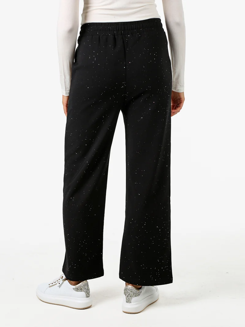 Pantaloni donna con dettagli brillanti e interno felpato - nero