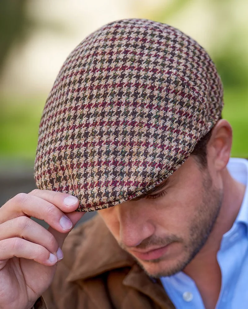 Schiebermütze "Henry Cap" aus original Harris Tweed in "country houndstooth"