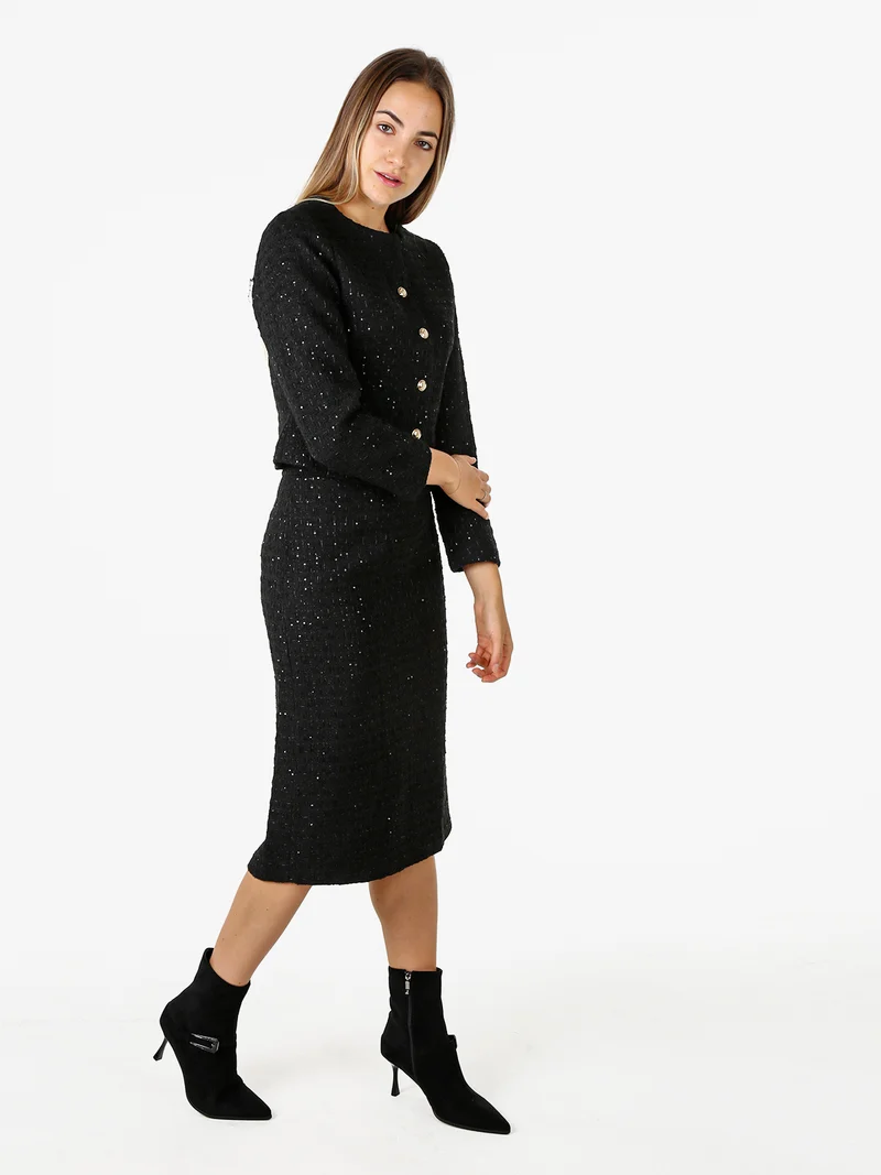 Completo elegante da donna con dettagli di paillettes e gonna- nero
