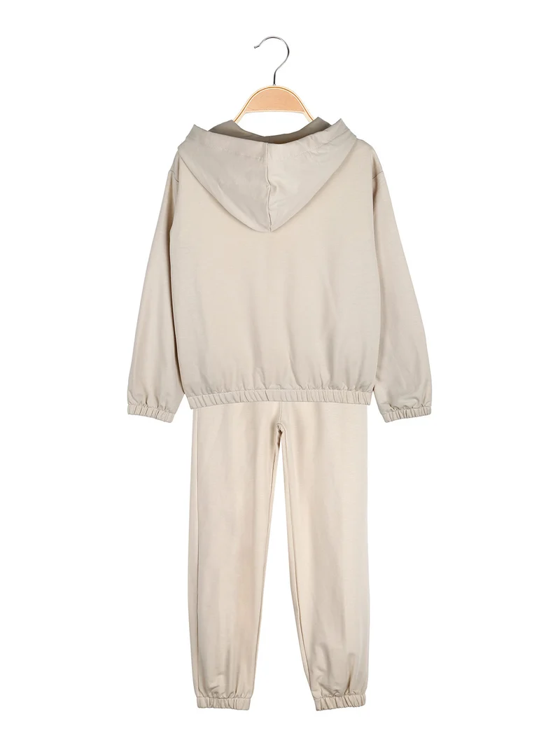 Completo tuta 3 pezzi da bambina con farfalle di strass cappuccio e zip - beige