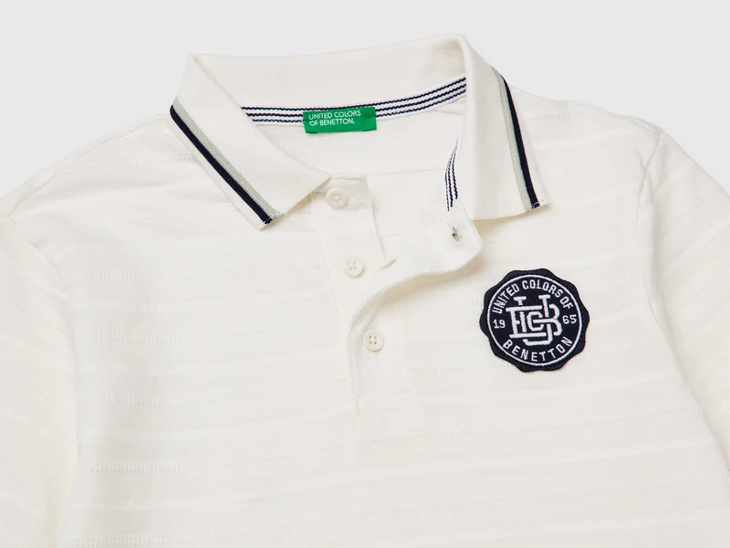Gestreiftes Poloshirt mit Aufnäher