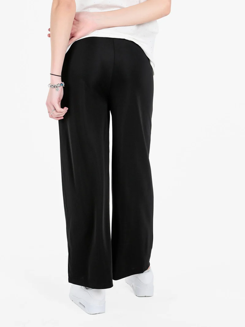 Pantaloni donna a gamba larga con coulisse - nero