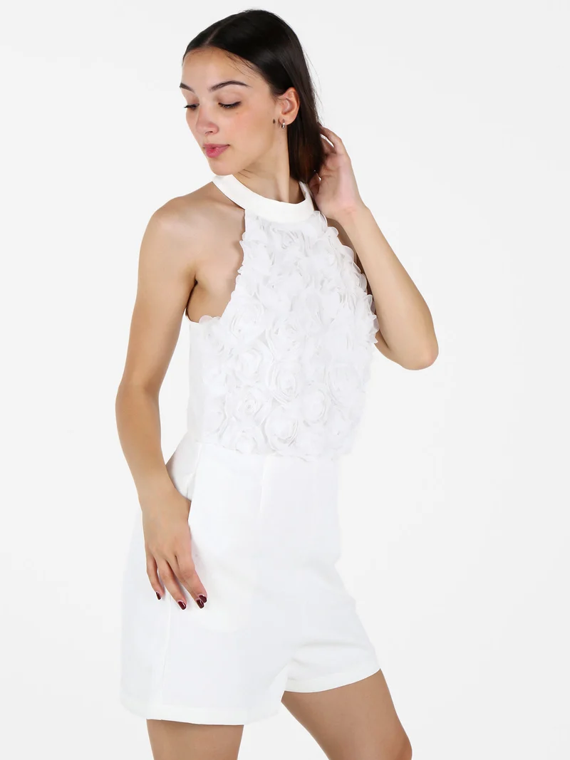 Tuta jumpsuite elegante da donna con allacciatura al collo - bianco