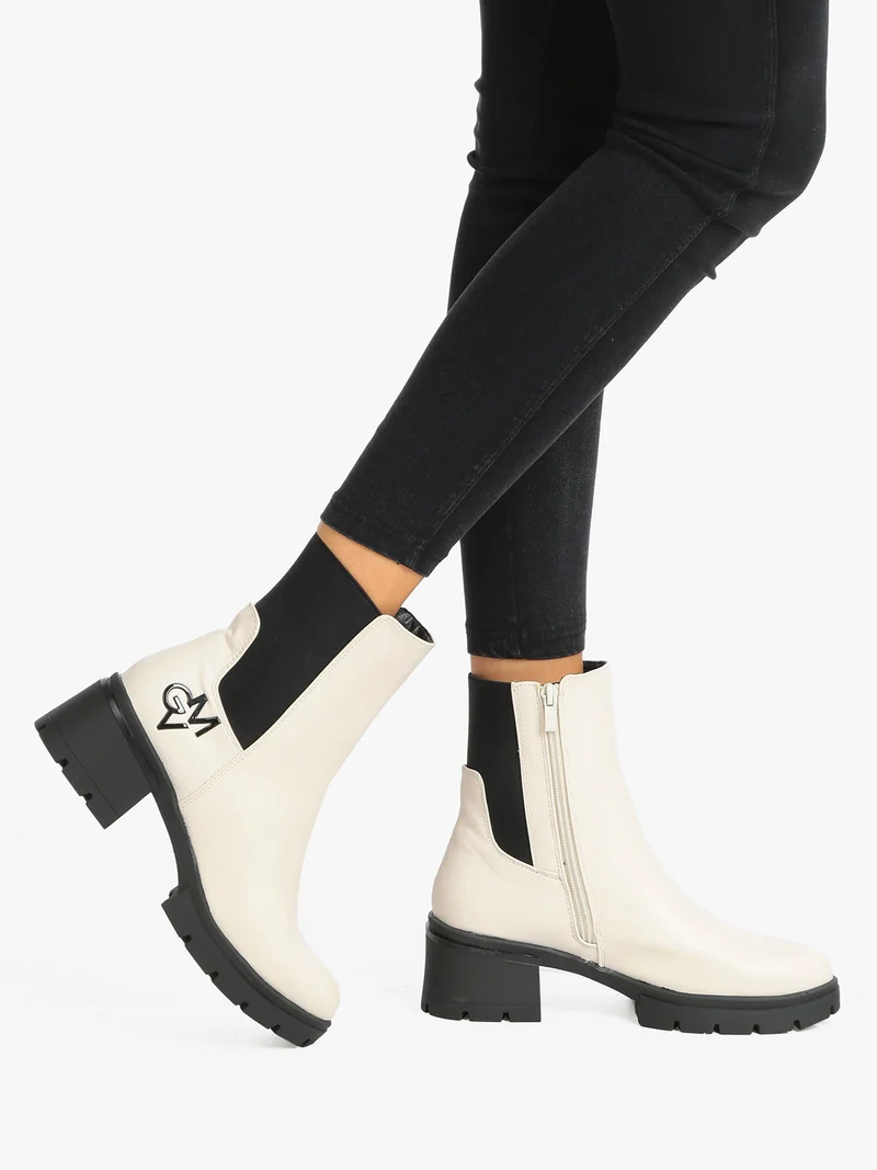 Tronchetti da donna con cerniera - beige