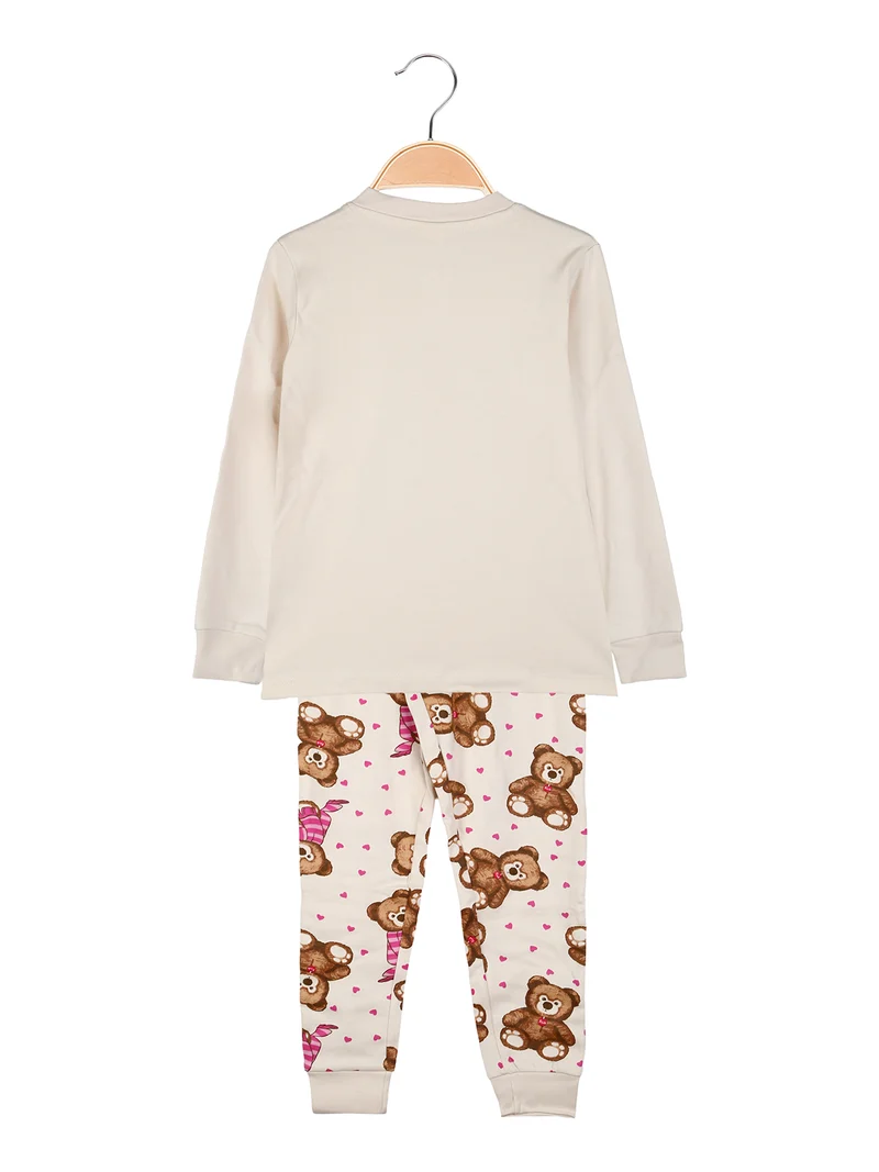 Pigiama lungo da bambina in cotone interlock con stampa cuori - panna