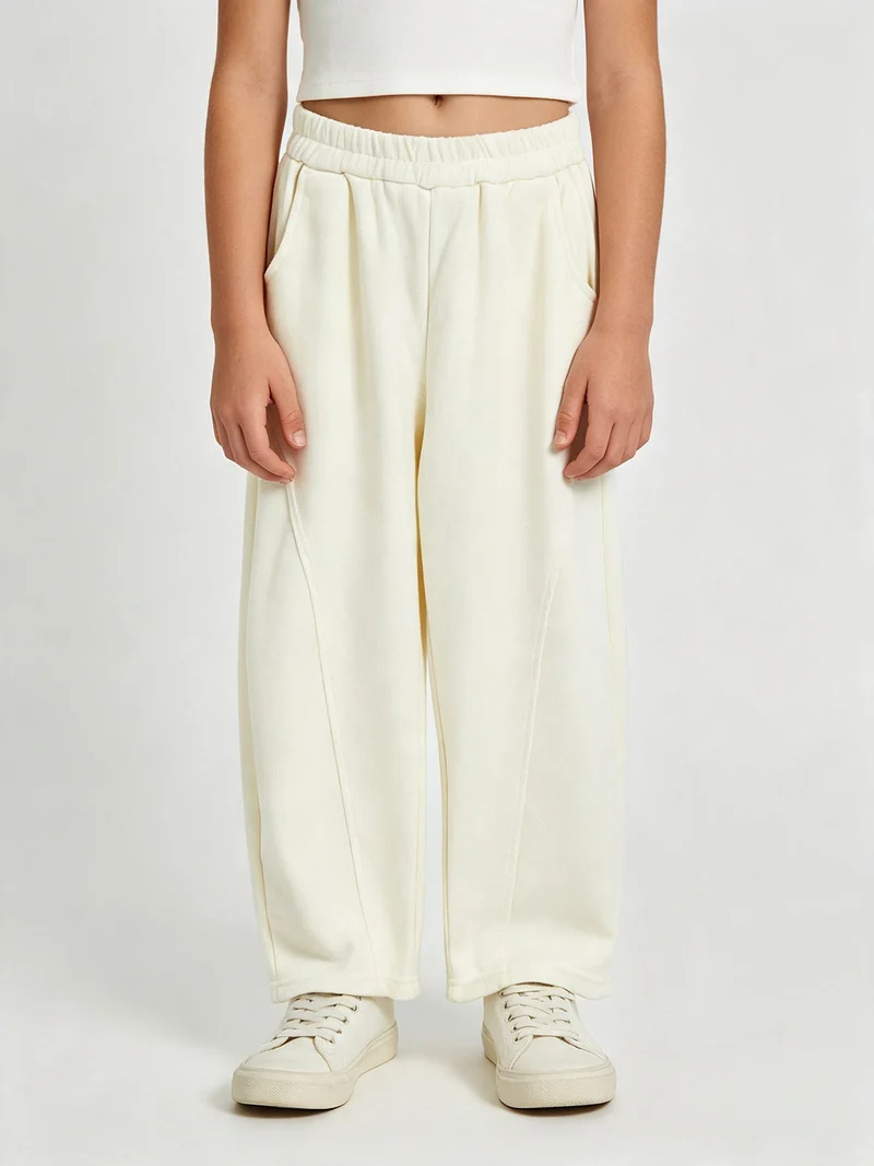 Pantaloni da bambina balloon in maglia con elastico in vita - panna