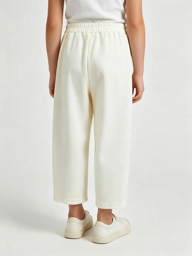 Pantaloni da bambina balloon in maglia con elastico in vita - panna