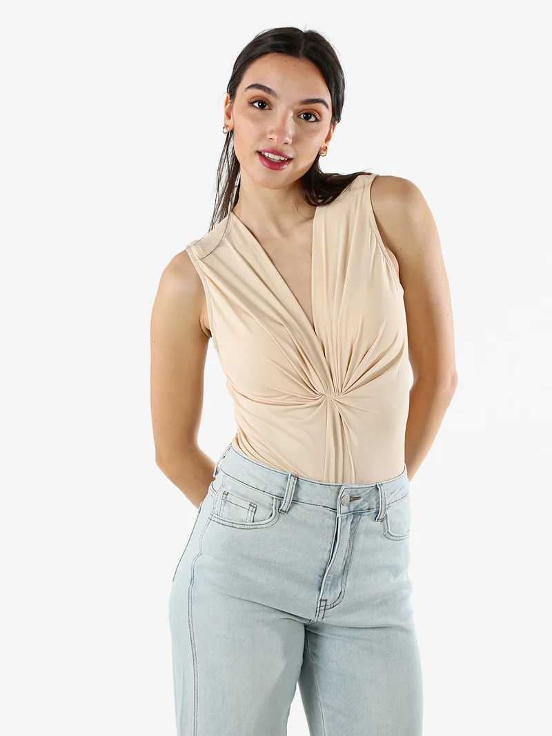 Body donna smanicato con scollo a V - beige