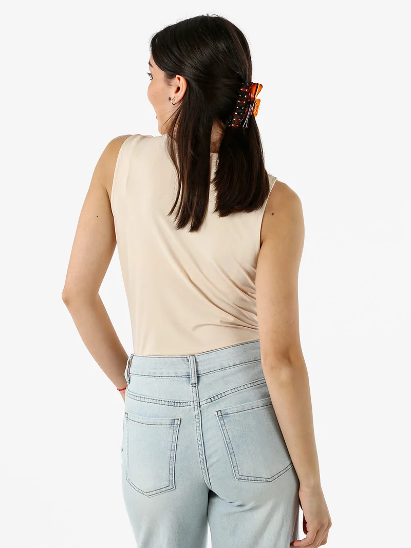 Body donna smanicato con scollo a V - beige