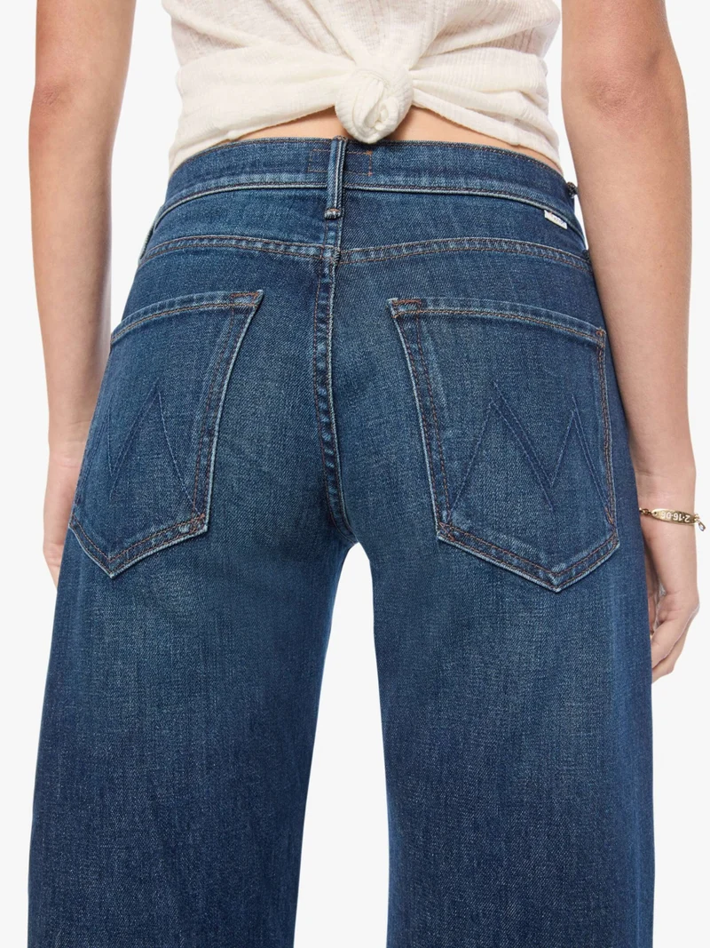 The Mid Rise Lasso Sneak Jeans