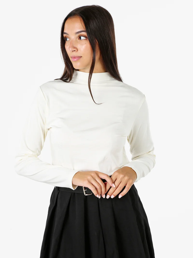 T-shirt donna a maniche lunghe in cotone con collo a lupetto - panna