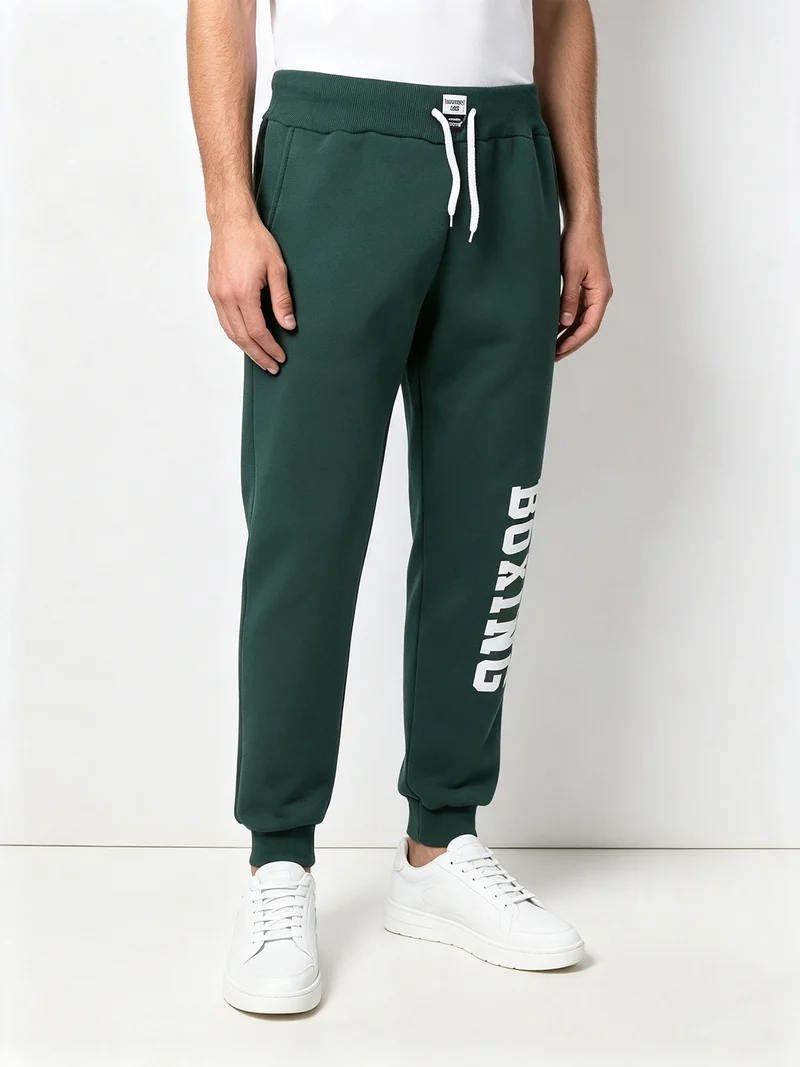 Pantaloni sportivi da uomo con interno felpato e coulisse - verde