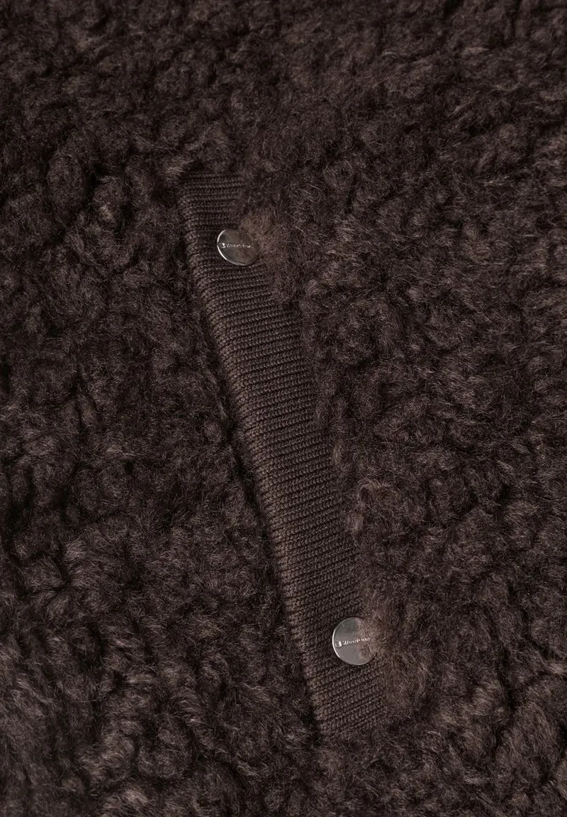Fake Fur Weste mit Strickdetails