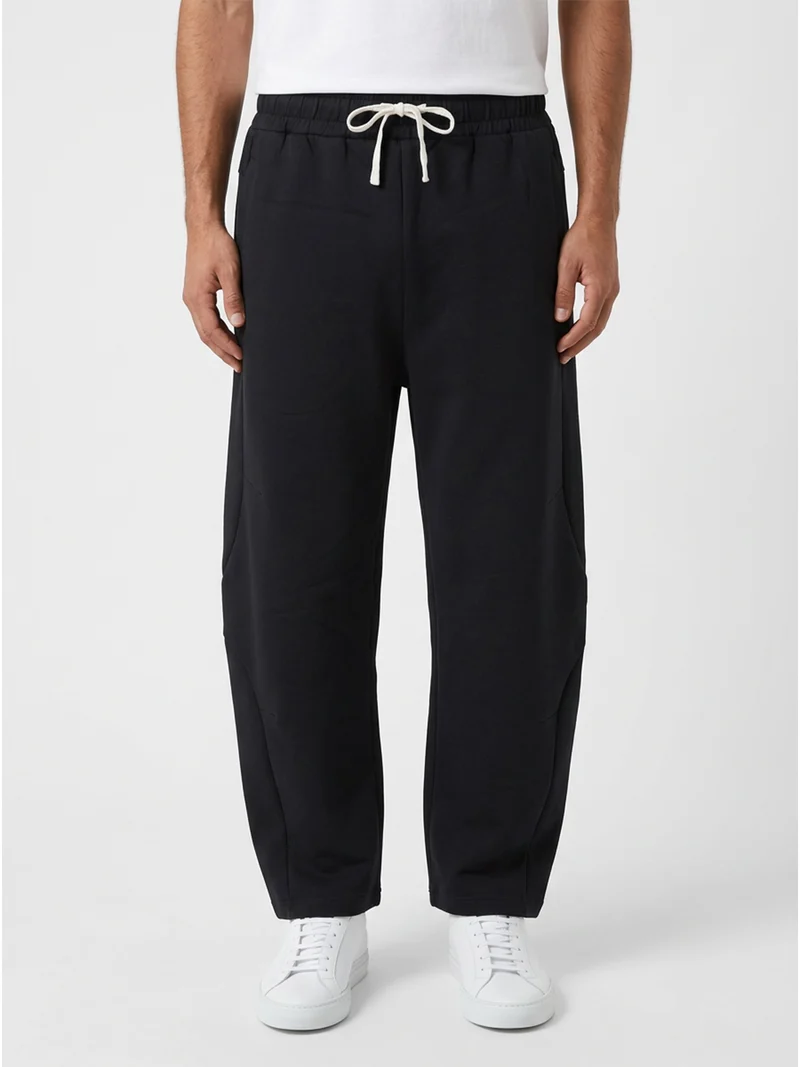 Pantaloni da uomo modello balloon con coulisse - nero