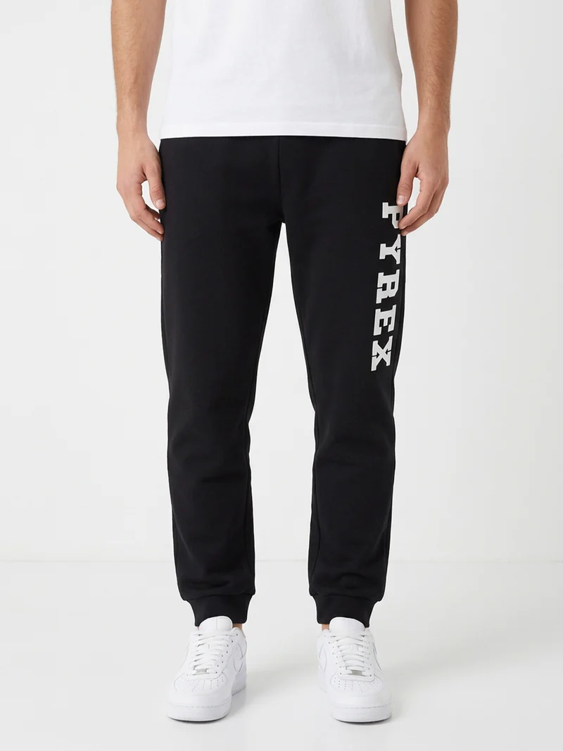 Pantaloni sportivi da uomo in felpa con polsini e logo - nero
