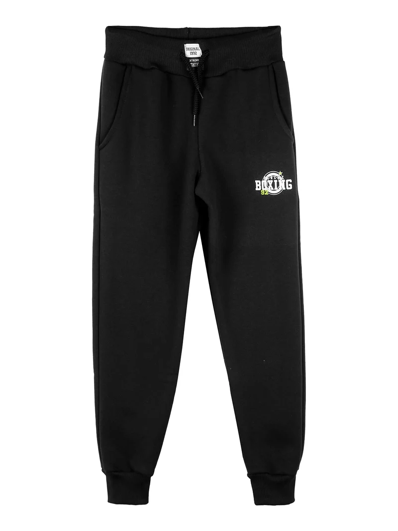 Pantaloni tuta da ragazzo in felpa con coulisse e polsini - nero