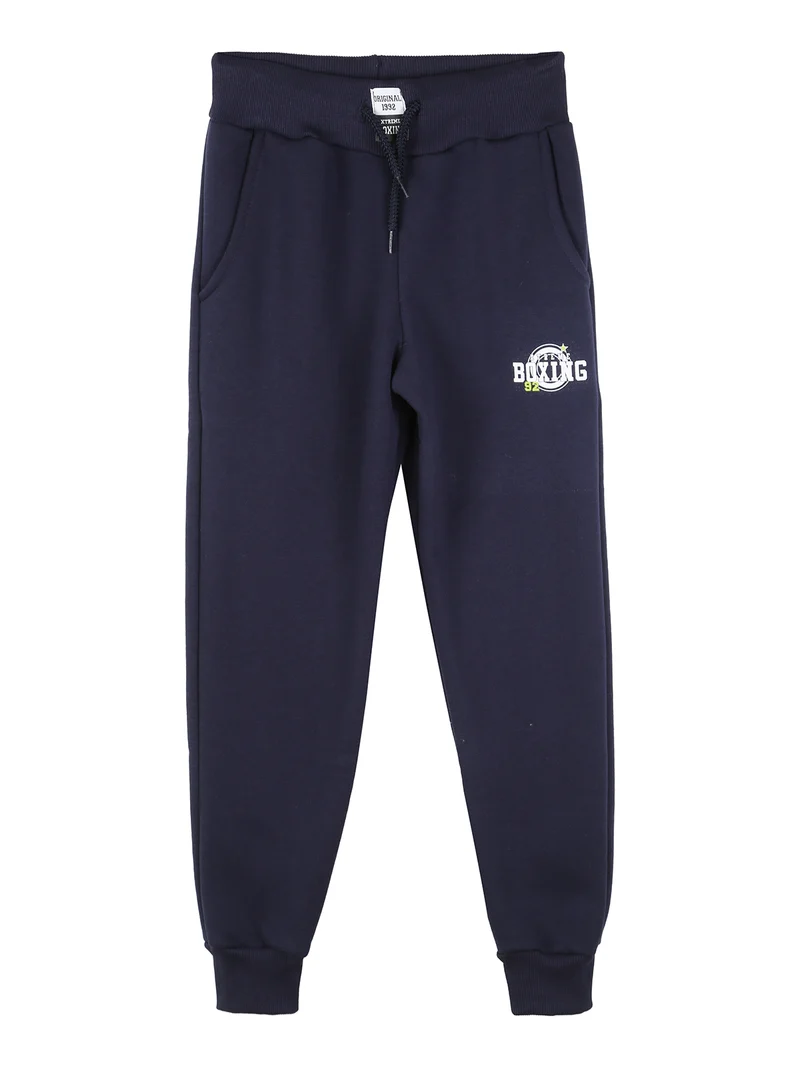 Pantaloni tuta da ragazzo in felpa con coulisse e polsini - blu scuro