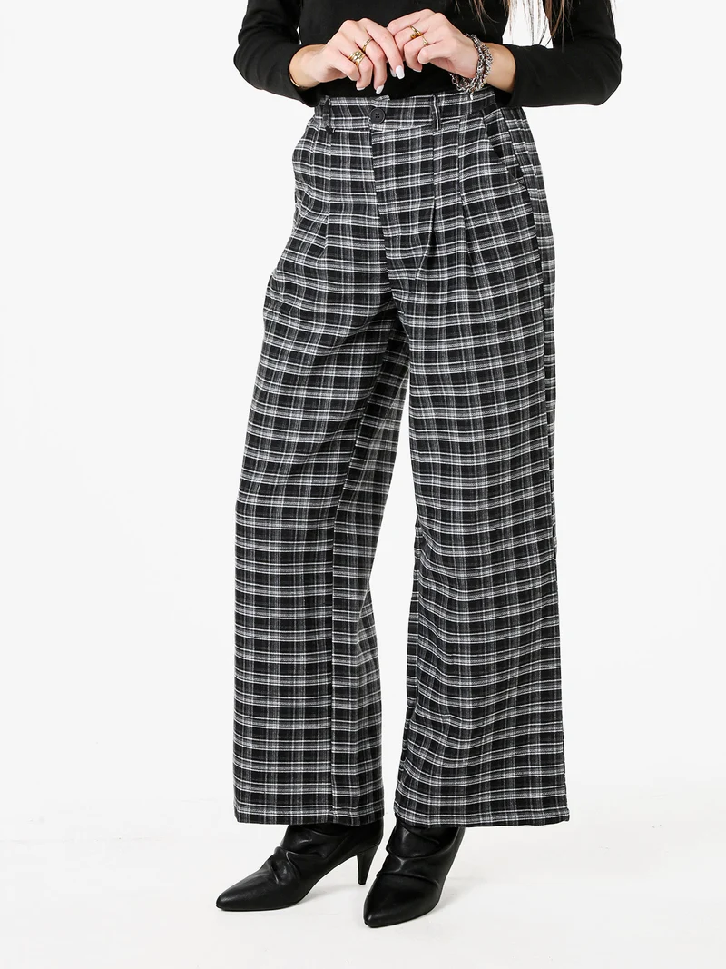 Pantaloni donna a gamba larga con stampa a quadri - nero