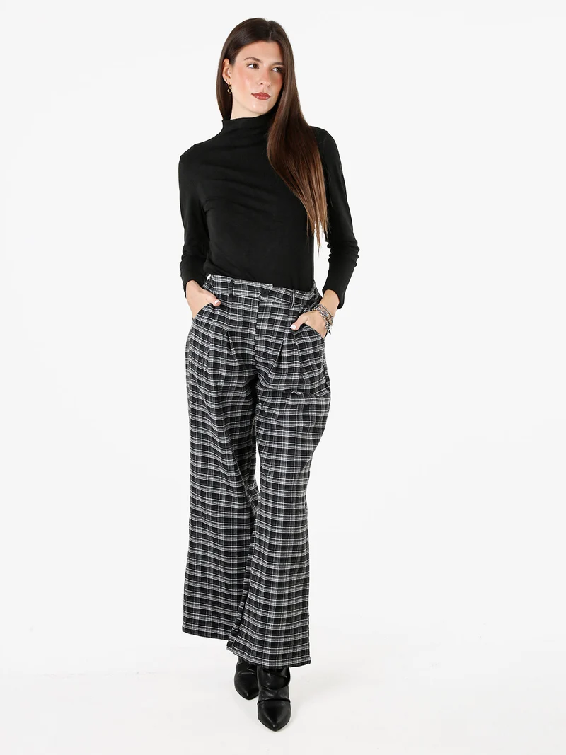 Pantaloni donna a gamba larga con stampa a quadri - nero