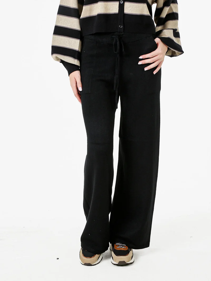 Pantaloni donna in maglia a gamba larga con coulisse - nero