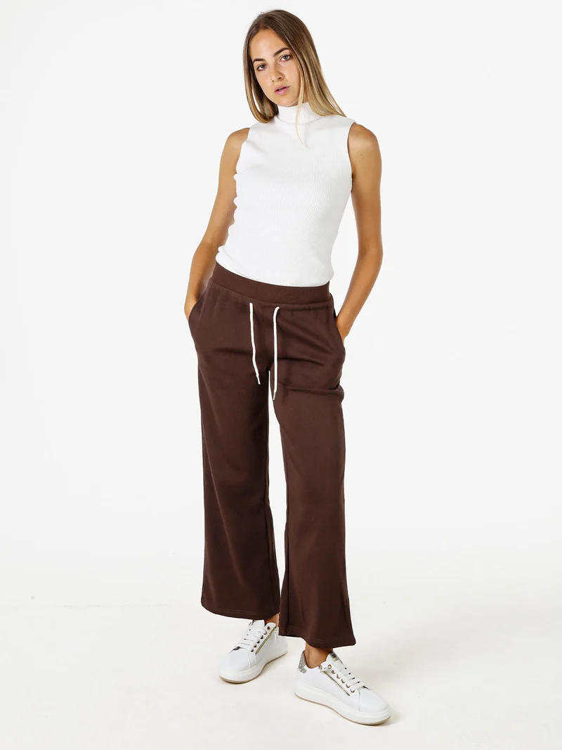 Maglia smanicata da donna con scollo a lupetto - bianco