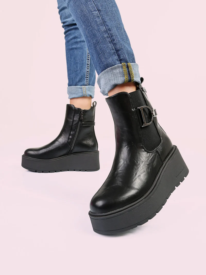 Stivaletti donna con zeppa platform e zip - nero