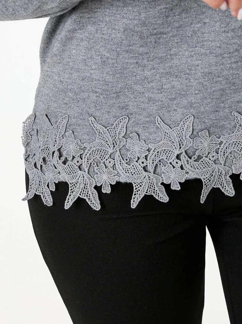 Maglia girocollo da donna con ricamo sul finale - grigio