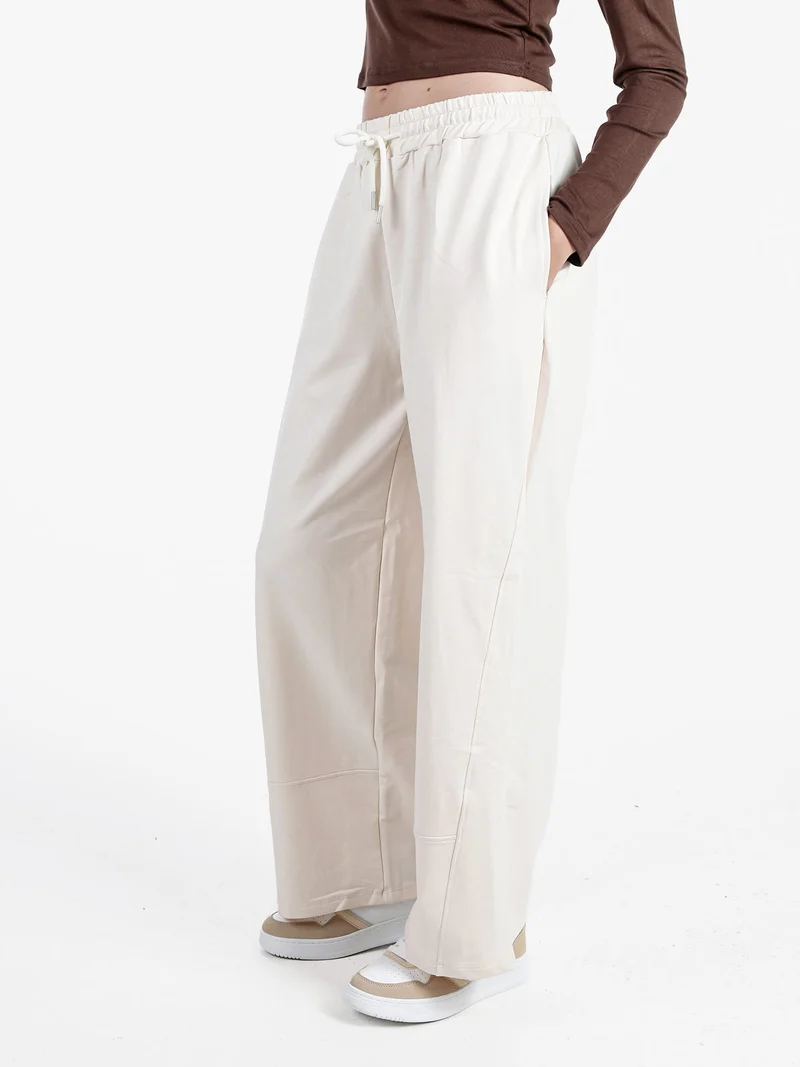 Pantaloni donna in cotone a gamba larga con coulisse - panna