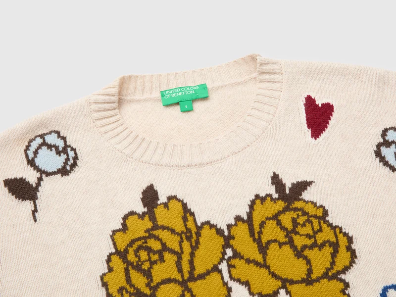 Pullover aus 100 % Wolle mit floralem Einsatz