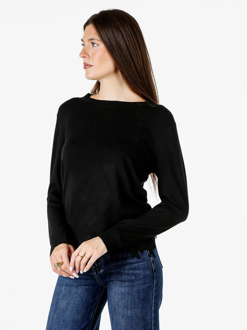 Maglia girocollo da donna con ricamo sul finale - nero