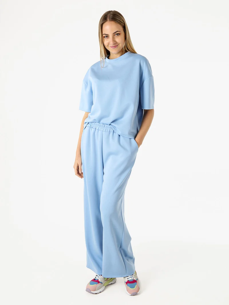 Pantaloni donna in felpa a gamba larga - azzurro