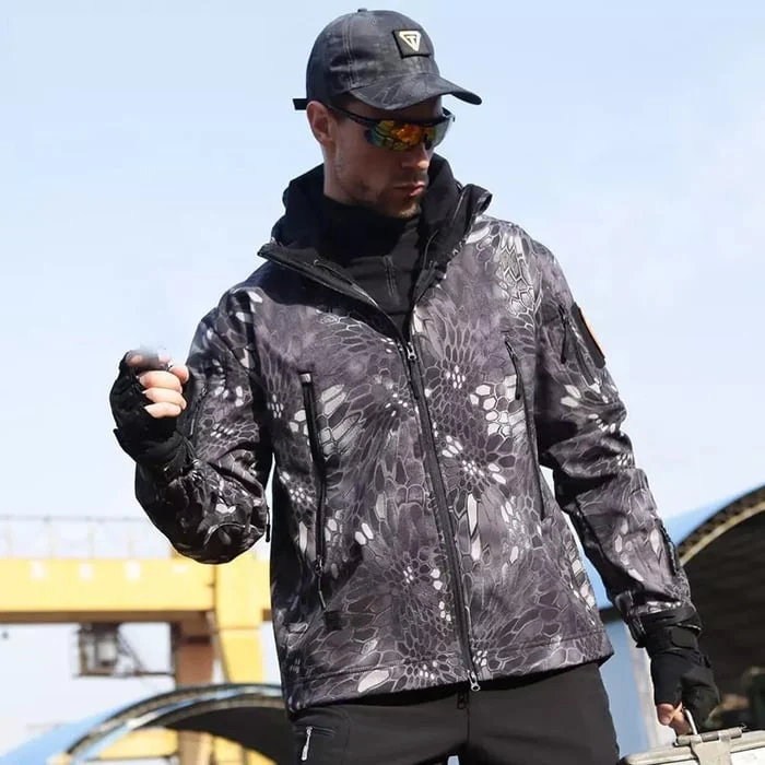 Herren Softshelljacke | Winddichte, wasserabweisende Outdoorjacke mit Kapuze, Fleecefutter und verstellbaren Bündchen